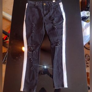 Black jeans with a white stripes down the side